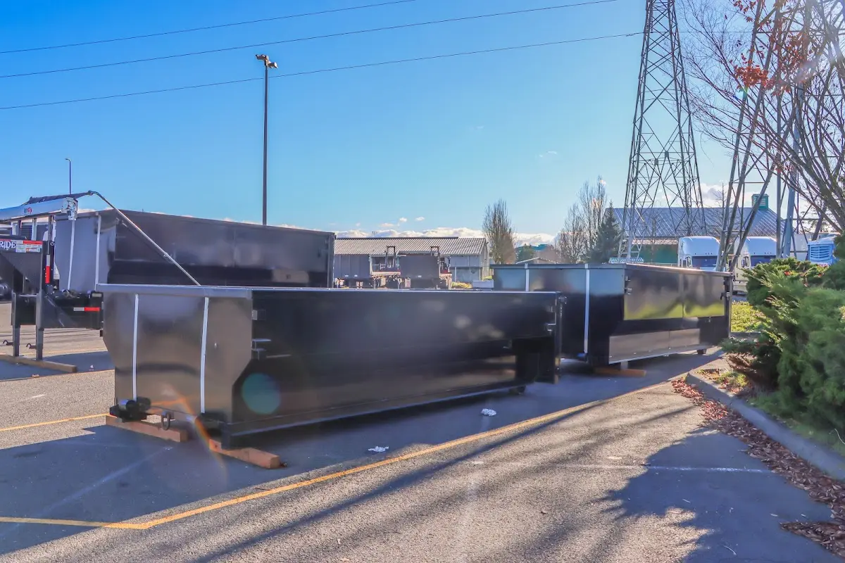 Roll-off dumpster ready for waste disposal at job site for 2 Yard Dumpster Rental in Orleans